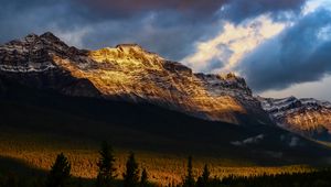 Preview wallpaper mountains, peaks, rock, rays, forest