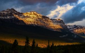 Preview wallpaper mountains, peaks, rock, rays, forest