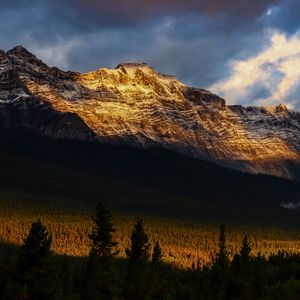 Preview wallpaper mountains, peaks, rock, rays, forest