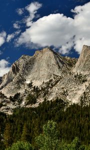 Preview wallpaper mountains, peaks, rocks, trees, spruce, sky