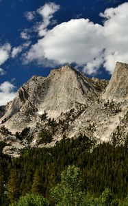 Preview wallpaper mountains, peaks, rocks, trees, spruce, sky