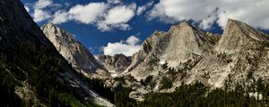 Preview wallpaper mountains, peaks, rocks, trees, spruce, sky