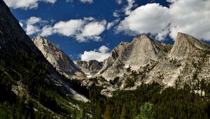 Preview wallpaper mountains, peaks, rocks, trees, spruce, sky