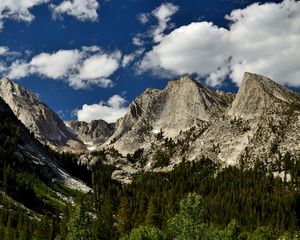 Preview wallpaper mountains, peaks, rocks, trees, spruce, sky