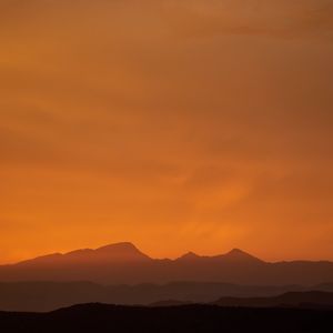 Preview wallpaper mountains, peaks, silhouette, sunset