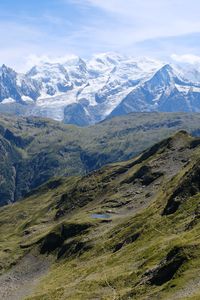 Preview wallpaper mountains, peaks, snow, grass, clouds