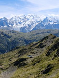 Preview wallpaper mountains, peaks, snow, grass, clouds