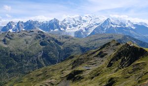 Preview wallpaper mountains, peaks, snow, grass, clouds