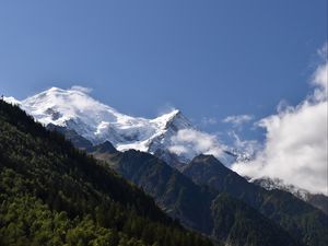 Preview wallpaper mountains, peaks, snow, trees, slope, forest, nature