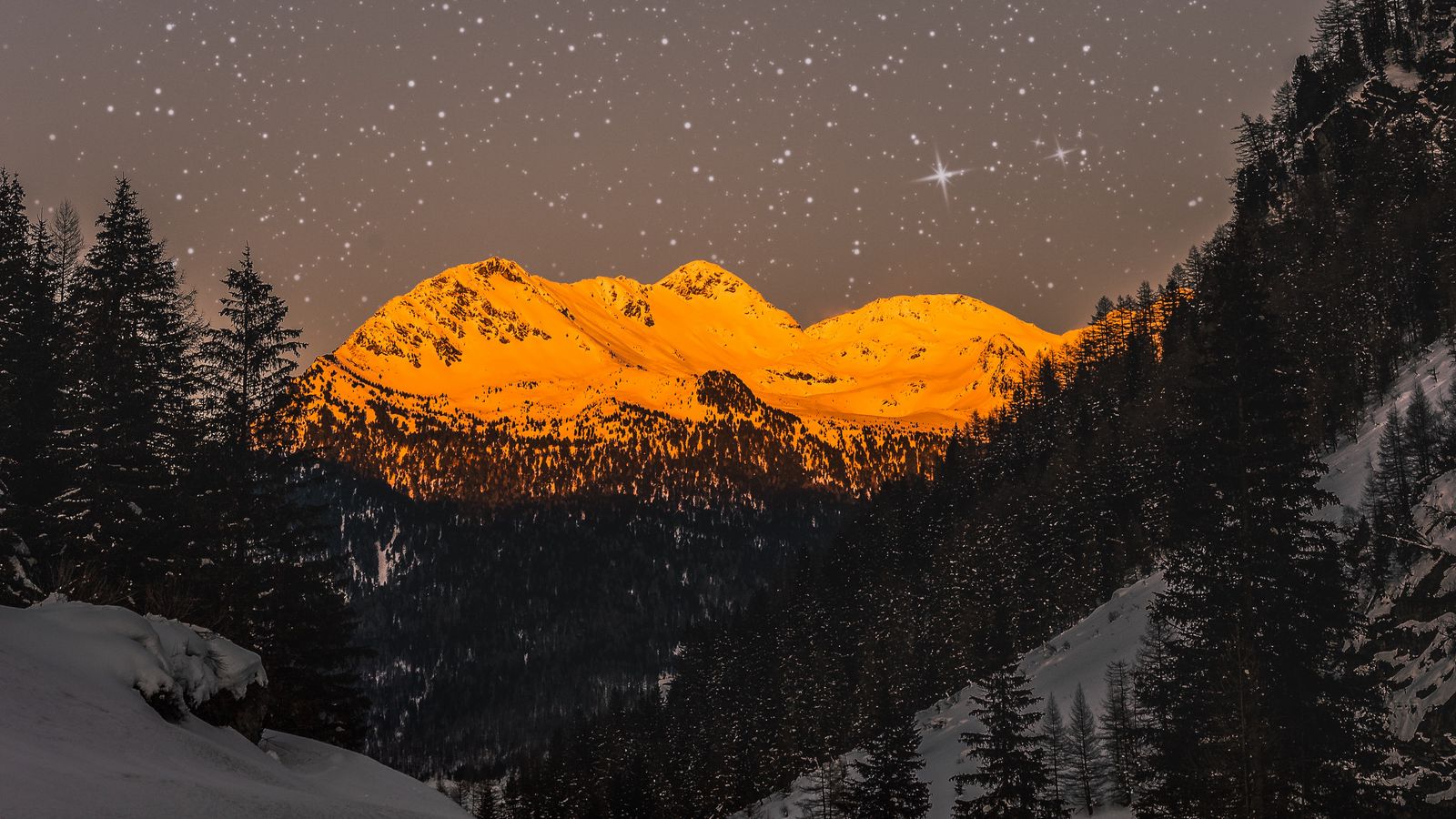 Download wallpaper 1600x900 mountains, peaks, snow, starry sky, winter ...