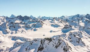 Preview wallpaper mountains, peaks, snow, snowy, sunlight