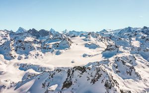 Preview wallpaper mountains, peaks, snow, snowy, sunlight