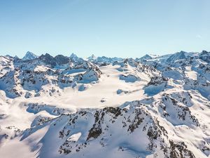 Preview wallpaper mountains, peaks, snow, snowy, sunlight