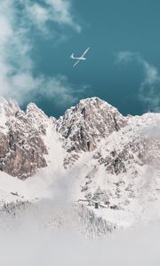 Preview wallpaper mountains, peaks, snow, airplane, clouds