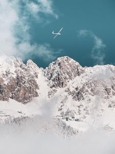 Preview wallpaper mountains, peaks, snow, airplane, clouds