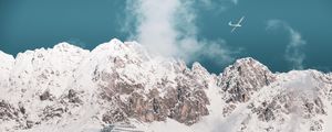 Preview wallpaper mountains, peaks, snow, airplane, clouds