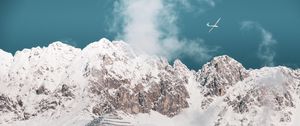 Preview wallpaper mountains, peaks, snow, airplane, clouds