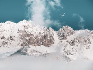 Preview wallpaper mountains, peaks, snow, airplane, clouds