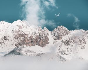 Preview wallpaper mountains, peaks, snow, airplane, clouds