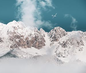 Preview wallpaper mountains, peaks, snow, airplane, clouds