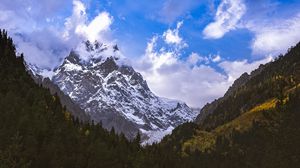 Preview wallpaper mountains, peaks, snow, snowy, slope, trees