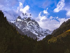 Preview wallpaper mountains, peaks, snow, snowy, slope, trees