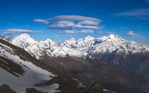 Preview wallpaper mountains, peaks, snow, snowy, rocks, sky