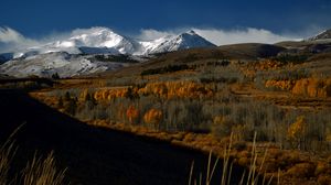 Preview wallpaper mountains, peaks, snow, snowy, trees, landscape