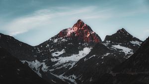 Preview wallpaper mountains, peaks, snow, snowy, sky, rocks