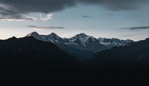 Preview wallpaper mountains, peaks, snow, clouds, dark