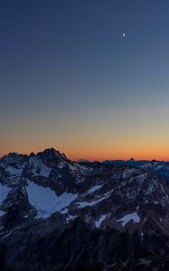 Preview wallpaper mountains, peaks, snowy, sunset, evening, sky
