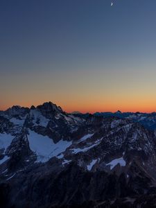 Preview wallpaper mountains, peaks, snowy, sunset, evening, sky