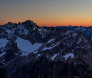 Preview wallpaper mountains, peaks, snowy, sunset, evening, sky