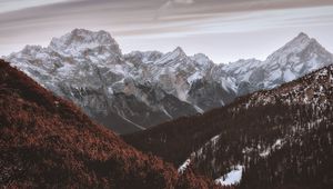 Preview wallpaper mountains, peaks, snowy, trees, sky