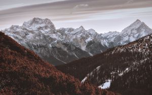 Preview wallpaper mountains, peaks, snowy, trees, sky