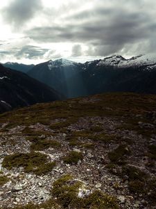 Preview wallpaper mountains, peaks, sun rays, sky, clouds