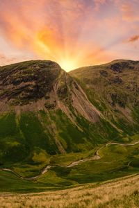 Preview wallpaper mountains, peaks, sunset, grass, meadow