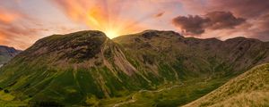 Preview wallpaper mountains, peaks, sunset, grass, meadow