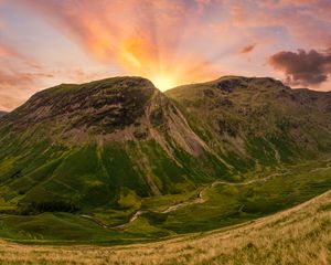 Preview wallpaper mountains, peaks, sunset, grass, meadow