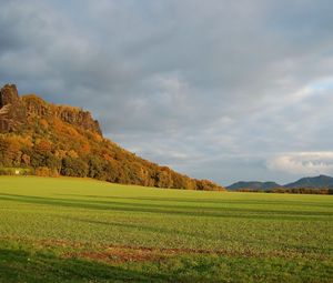 Preview wallpaper mountains, plain, clouds, grass, green, trees, shadow