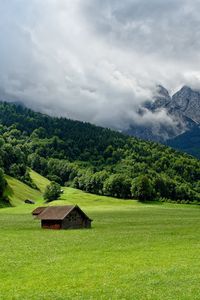 Preview wallpaper mountains, plain, lodges, clouds, smoke, sky