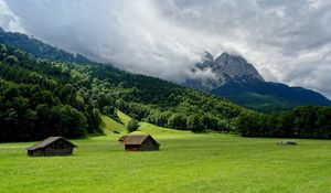 Preview wallpaper mountains, plain, lodges, clouds, smoke, sky