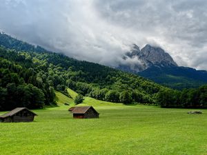 Preview wallpaper mountains, plain, lodges, clouds, smoke, sky