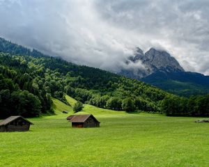 Preview wallpaper mountains, plain, lodges, clouds, smoke, sky