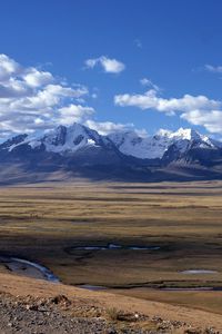 Preview wallpaper mountains, plain, sky, clouds, water