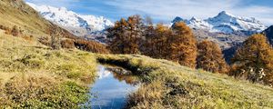 Preview wallpaper mountains, puddle, trees, grass, landscape, nature