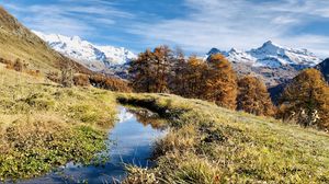 Preview wallpaper mountains, puddle, trees, grass, landscape, nature