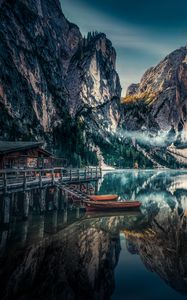 Preview wallpaper mountains, reflection, kayak, fog, dolomite mountains, italy