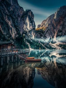 Preview wallpaper mountains, reflection, kayak, fog, dolomite mountains, italy