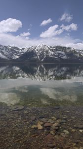 Preview wallpaper mountains, reflection, lake, bottom, stones, sky, clouds